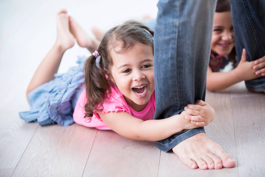 kids playing on hardwood flooring Kennesaw GA home